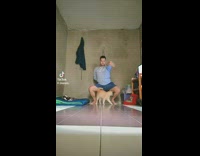 Man Dances to the Music with Cat