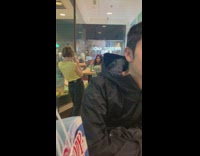 Green shirt girl ice cream cup