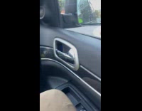 Woman bikini top crosses street for video