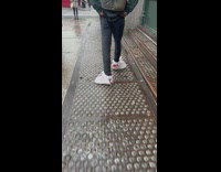 Guy wear plastics bags raincoat for his kicks 