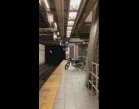 Motorcycle left alone on subway platform