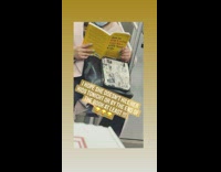Woman Reads Parenting Book on Subway