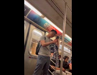 Man shaves facial hair inside the train