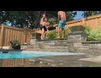 Two guys hold swing friend into pool 