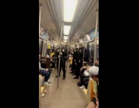 Submitter shows group wears costume riding subway 