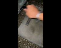 Guy use squeegee on wet rug satisfying