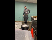 Man pranked by co-workers while working