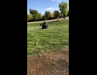 man in four wheeler flips the guy in blue falls out
