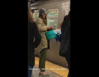 girl has chicken in blue basket