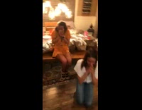 Woman drops birthday cake on the floor, guy picks it up intact