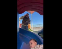 Guy accidentally hits head on baby slide 