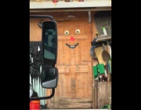 Door with funny face at back truck