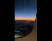 View of the horizon sunrise on the airplane in the sky