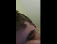 Blue shirt guy rubs and taps eye 