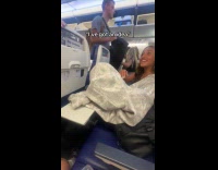 Woman use hoodie to pretend as passenger