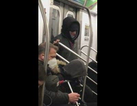 Guy wears Joker makeup on train 