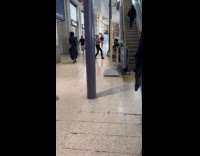 Collab IITW - Woman sweatshirt crop top dances beside escalator