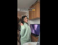 Girl green hoodie sweats flirty slow motion wink kiss