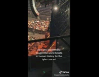 Guy at concert in seats behind of the stage worse spot ever