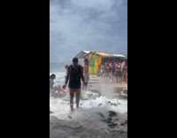 Woman hit by log from splash hole