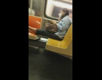 Woman in train put feet on seats