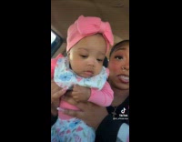 Woman films her family inside the car