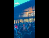 Crowd cheers sing Feliz Navidad after concert part 1