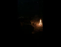 Fireworks explode in watermelon night camp fire