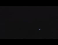 Person on rooftop during rain lightning strike