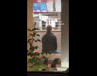 Dad waiting to pick up daughter from work and she walks by 