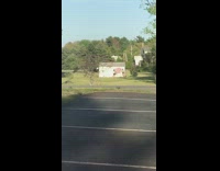 Girl stand beside ice cream painting wall
