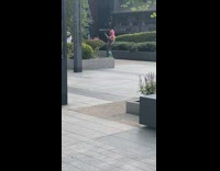 Woman with pink hair and dress selfie dance