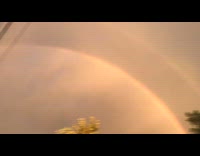 Man Awes Over Two Parallel Rainbows in Sky