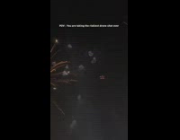 Drone flying in air by fireworks 