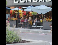 Guy drops food in front of people at restaurant patio and screams, asks people to open pickle jar 