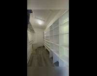 Unpacking clothes into closet time lapse