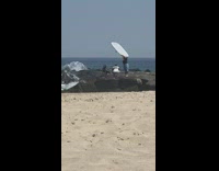 Woman black dress lie down sideways pictorial