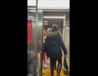 Bunch of santas board train 