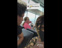 Guy records friend asking stranger at airport if he can bite sandwich