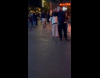 Woman white jacket tiktok dance on street