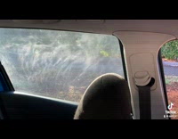 Car Window Emits Smoke under Sunlight as it Closes