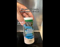 Man Smells Cock Flavored Condiment in Shaker