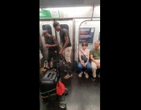 Group of guys perform in train ride