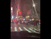 Tesla Cybertruck wrapped with Christmas lights night