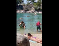 Woman pose with mom cameraman hold dog