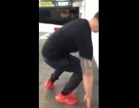 Guy black clothes limbo parking exit barrier arm fail gate