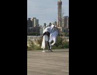 Guy dips girl white ghost halloween costume