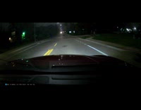 Guy in toy motorcycle go kart in road 