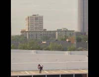 Woman cardigan sing and dance parking rooftop