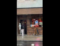 Collab WINY - Man carries mannequin goes inside the pub 